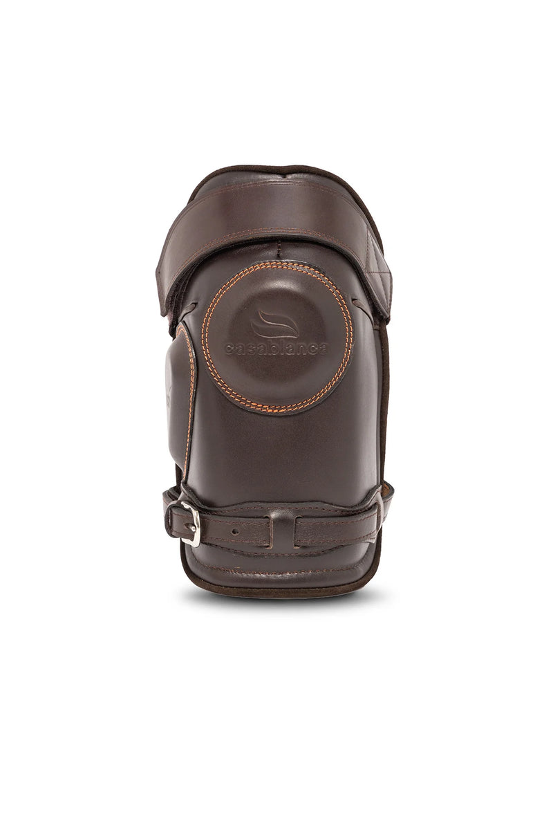 Brown Casablanca Polo Buckle Kneeguards with visible stitching and buckle straps.